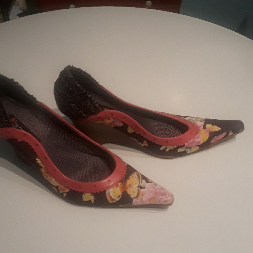 Wedge heel shoes floral fabric heels worn once. To